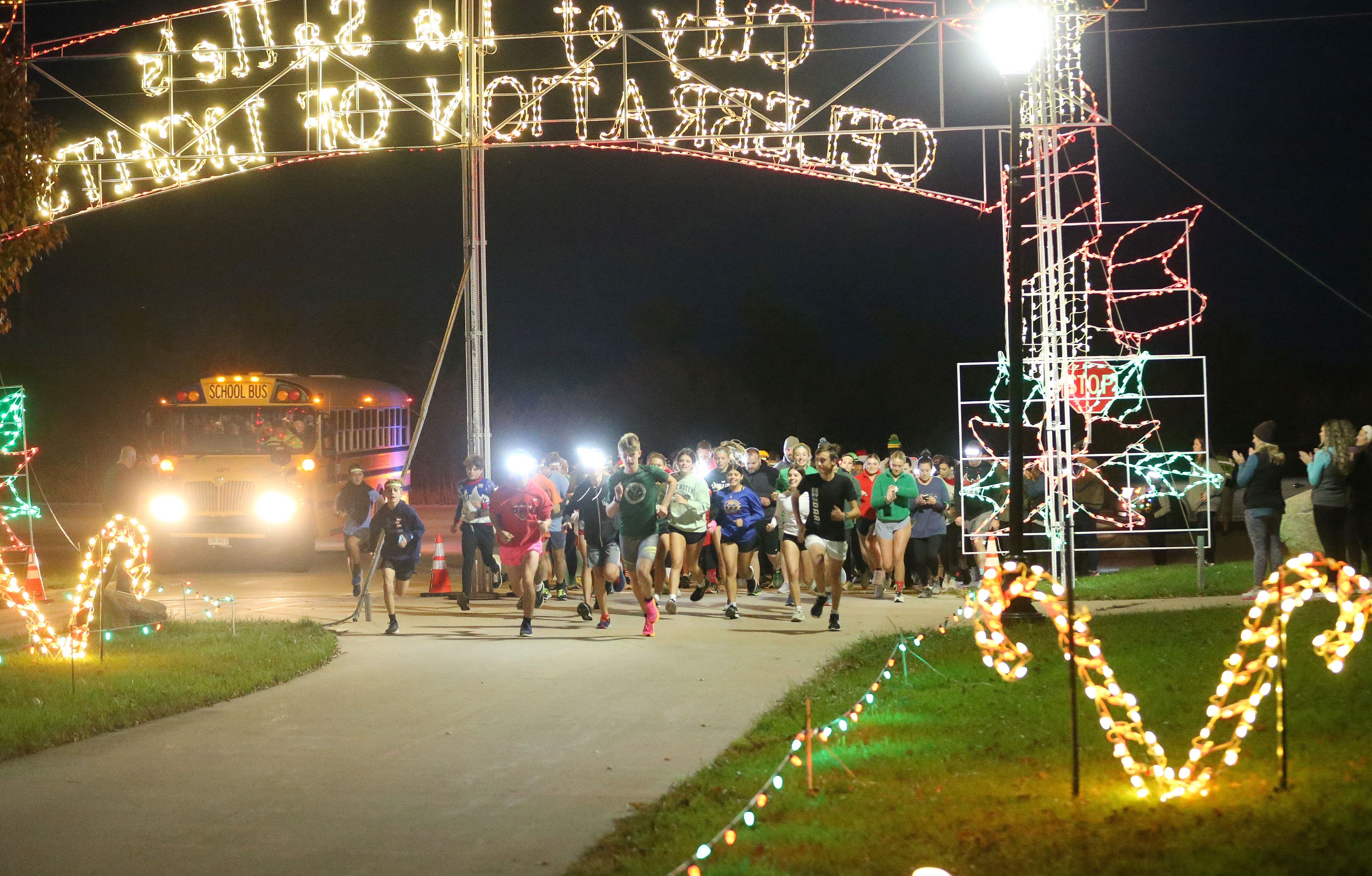 Hundreds of people begin the Run Run Rudolph 5K Fun Run on Sunday, Nov. 5, 2023 at Rotary Park in La Salle. The Celebration Of Lights is the area’s largest drive-thru Christmas light display, stretching throughout Rotary Park on the east side of La Salle.