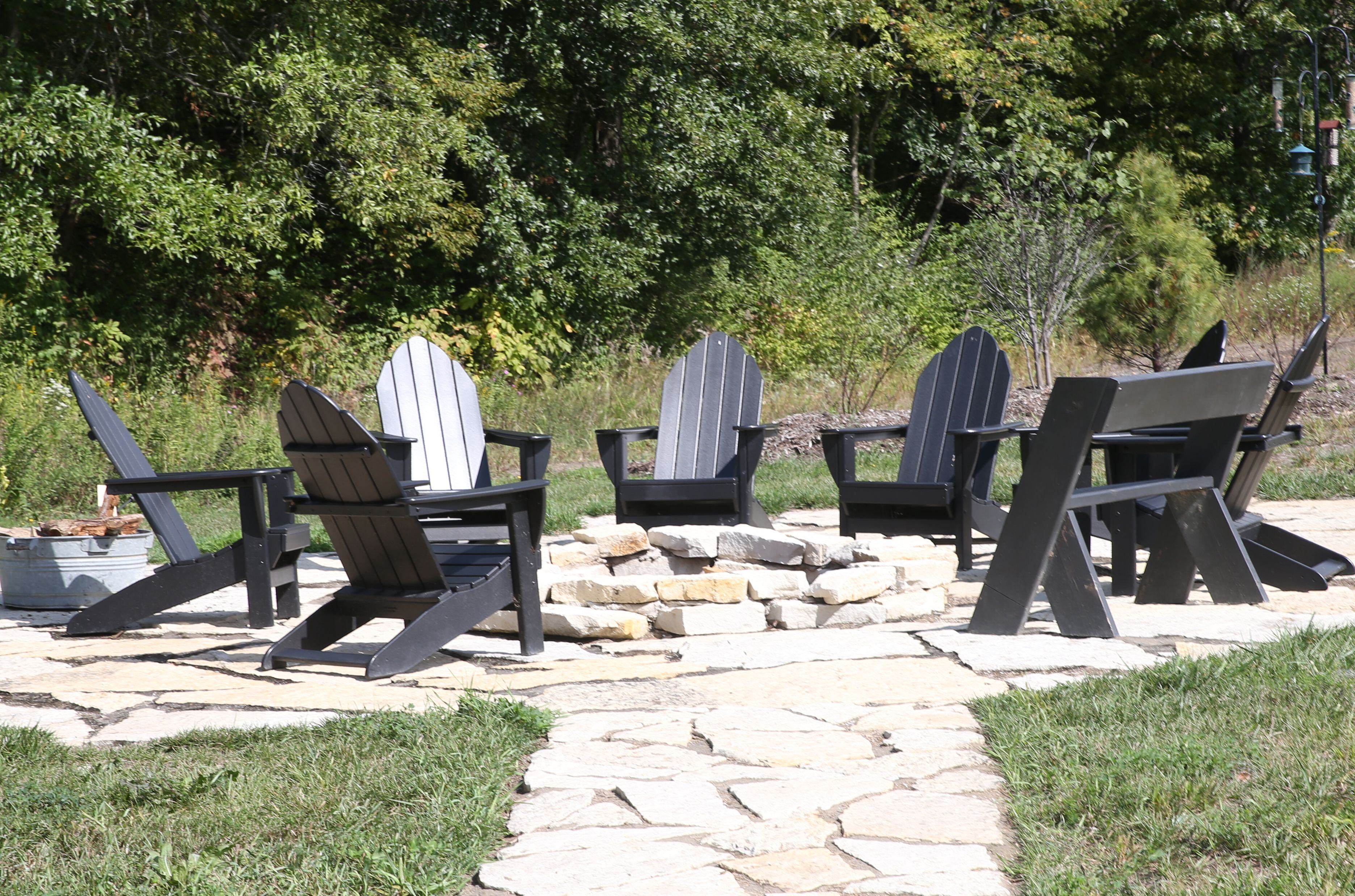 A view of an outdoor fire pit on Monday, Sept. 18, 2023 at Camp Aramoni near Lowell.