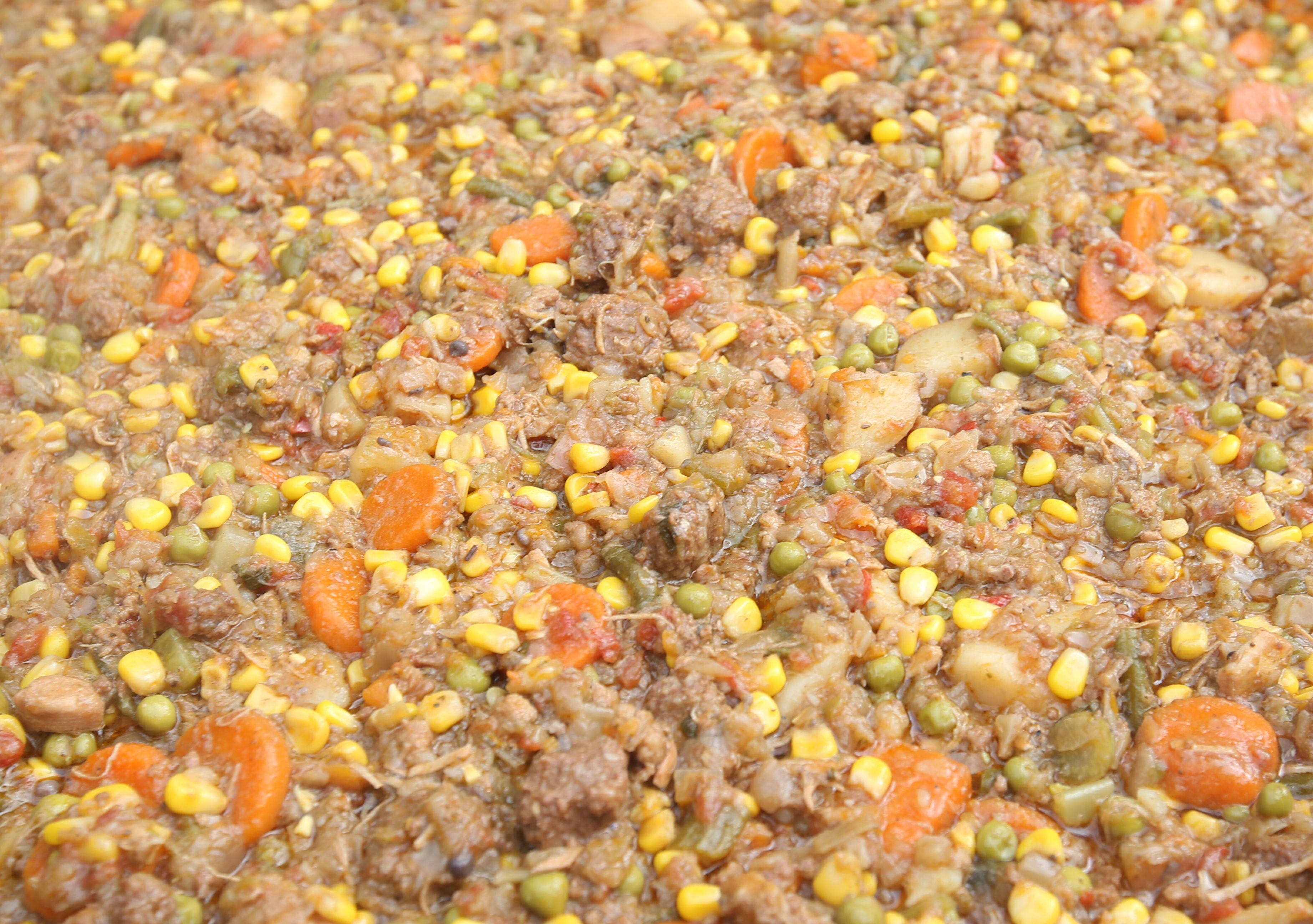 A large amount of Burgoo stew bubbles in a kettle for the 53rd annual Burgoo on Sunday, Oct. 8, 2023 downtown Utica.