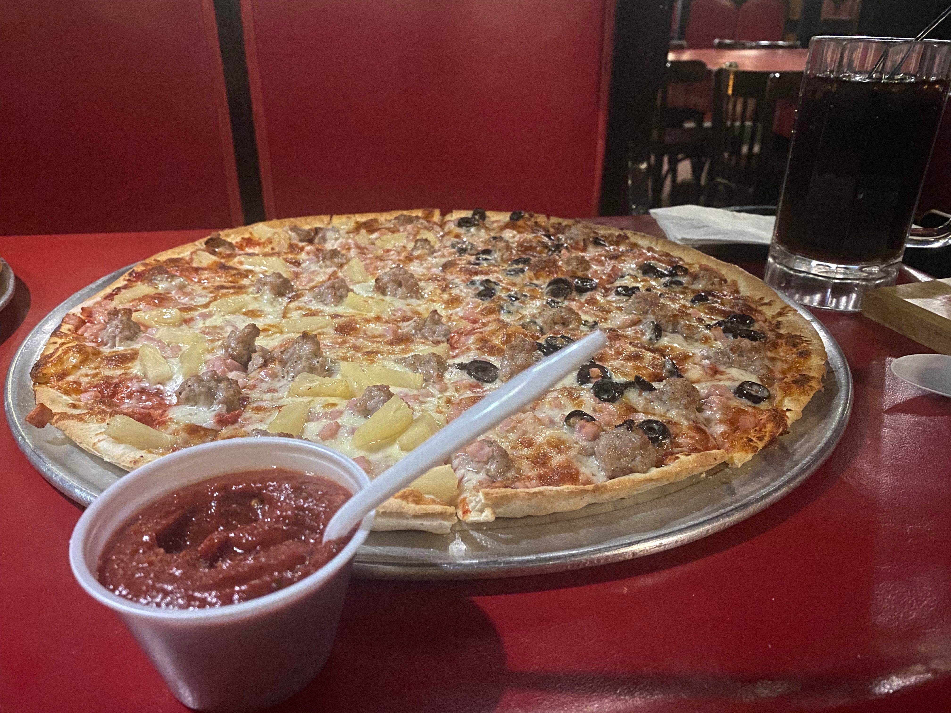 Whatever your preferred toppings, the Mystery Diner highly recommends slathering your pie with Bianchi's hot sauce, a tomato paste-like condiment that brings both a tangy flavor and a bit of heat.