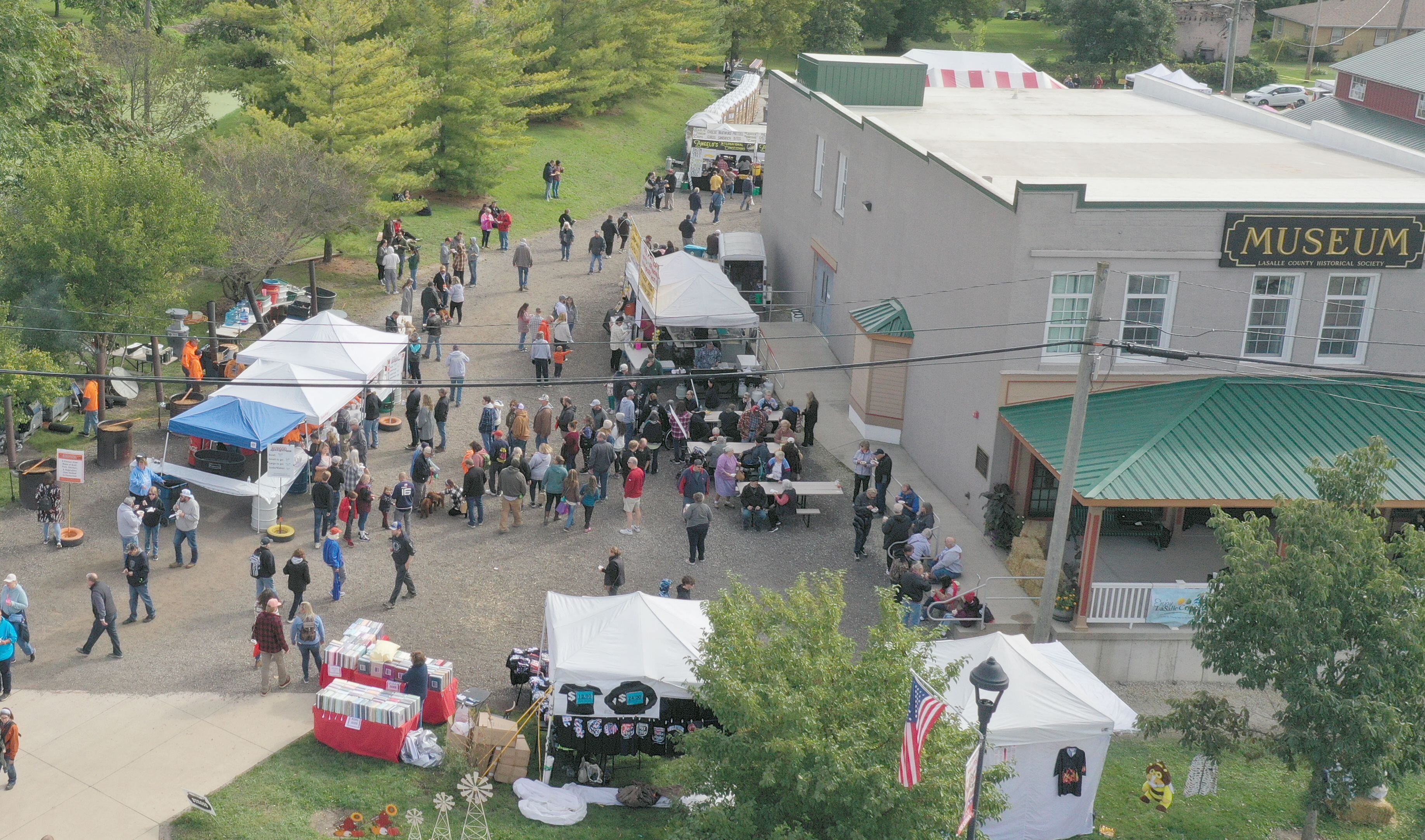 An aerial view of the Burgoo kettles and La Salle County Historical Society Canal Market building during the 53rd annual Burgoo on Sunday, Oct. 8, 2023 downtown Utica.