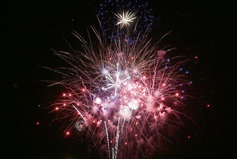 Crack, boom, bam! Fireworks illuminate the sky at Peru's 4th of July celebration Monday evening. The event also featured a car show, food vendors, craft show and bounce houses.