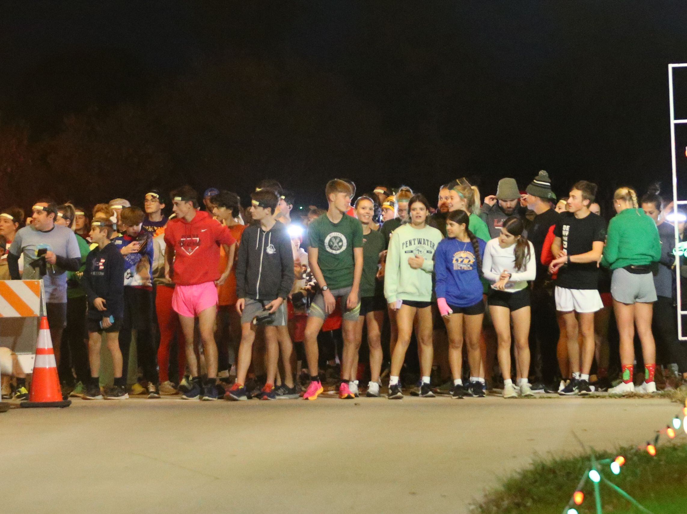 Hundreds of people gather before the Run Run Rudolph 5K Fun Run on Sunday, Nov. 5, 2023 at Rotary Park in La Salle. The Celebration Of Lights is the area’s largest drive-thru Christmas light display, stretching throughout Rotary Park on the east side of La Salle.