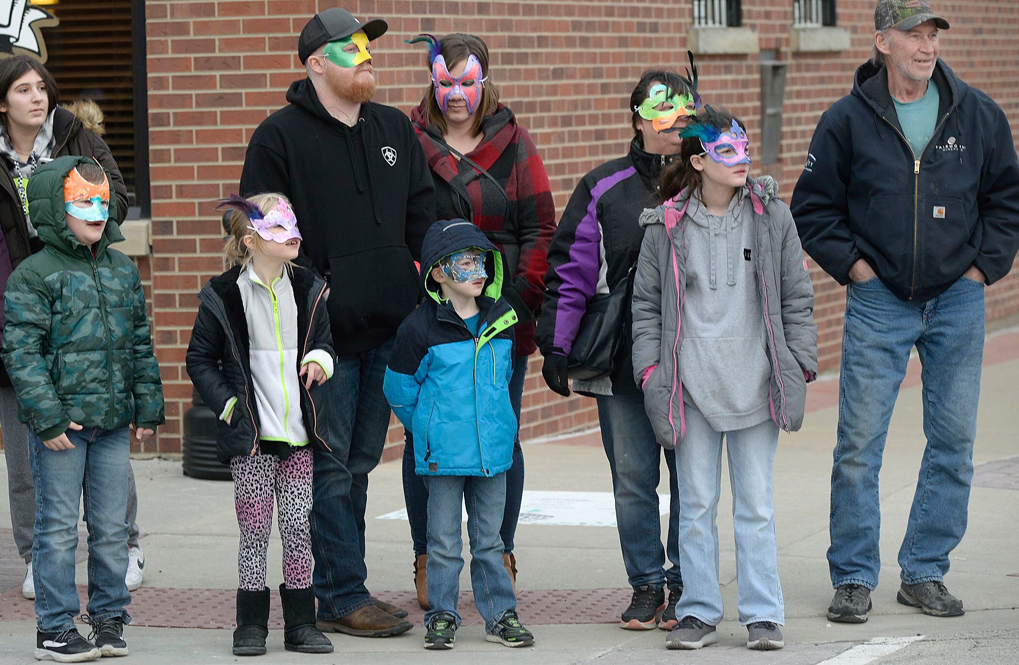 Hundreds attended the annual Mardi Gras parade Saturday, Feb. 18, 2023, in Utica. The parade made two trips around Mill Street.