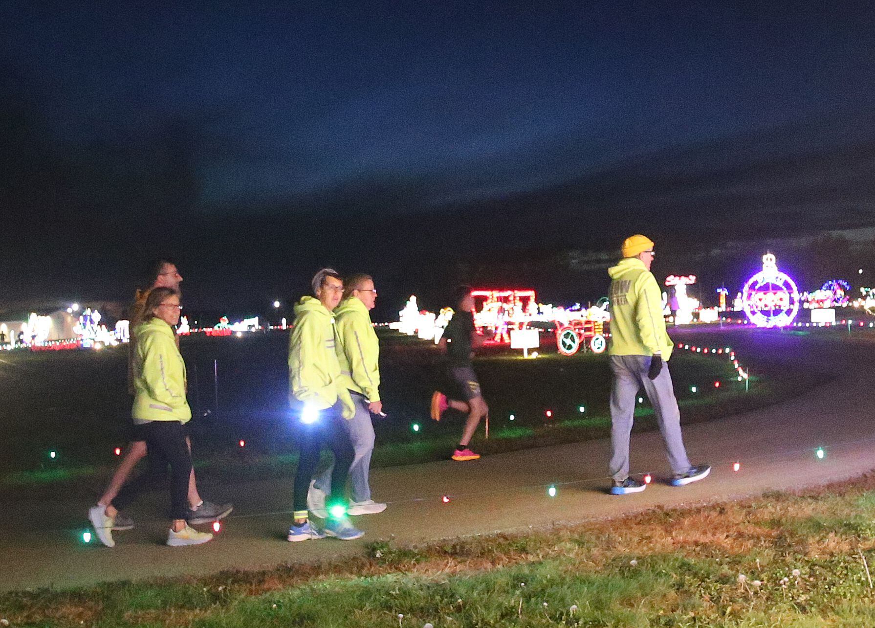 Participants make their way through the Run Run Rudolph 5K Fun Run on Sunday, Nov. 5, 2023 at Rotary Park in La Salle. The Celebration Of Lights is the area’s largest drive-thru Christmas light display, stretching throughout Rotary Park on the east side of La Salle.