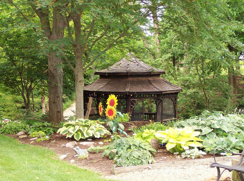 A gazebo in the garden provides a relaxing spot where you can take a break during your stroll along the garden paths at Hornbaker Gardens.