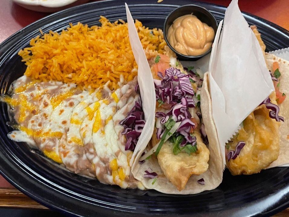 Fish tacos, a special at Jorge's Margaritas & Grill in La Salle, features deep-fried fillets with chipotle sauce and a side of rice and beans.