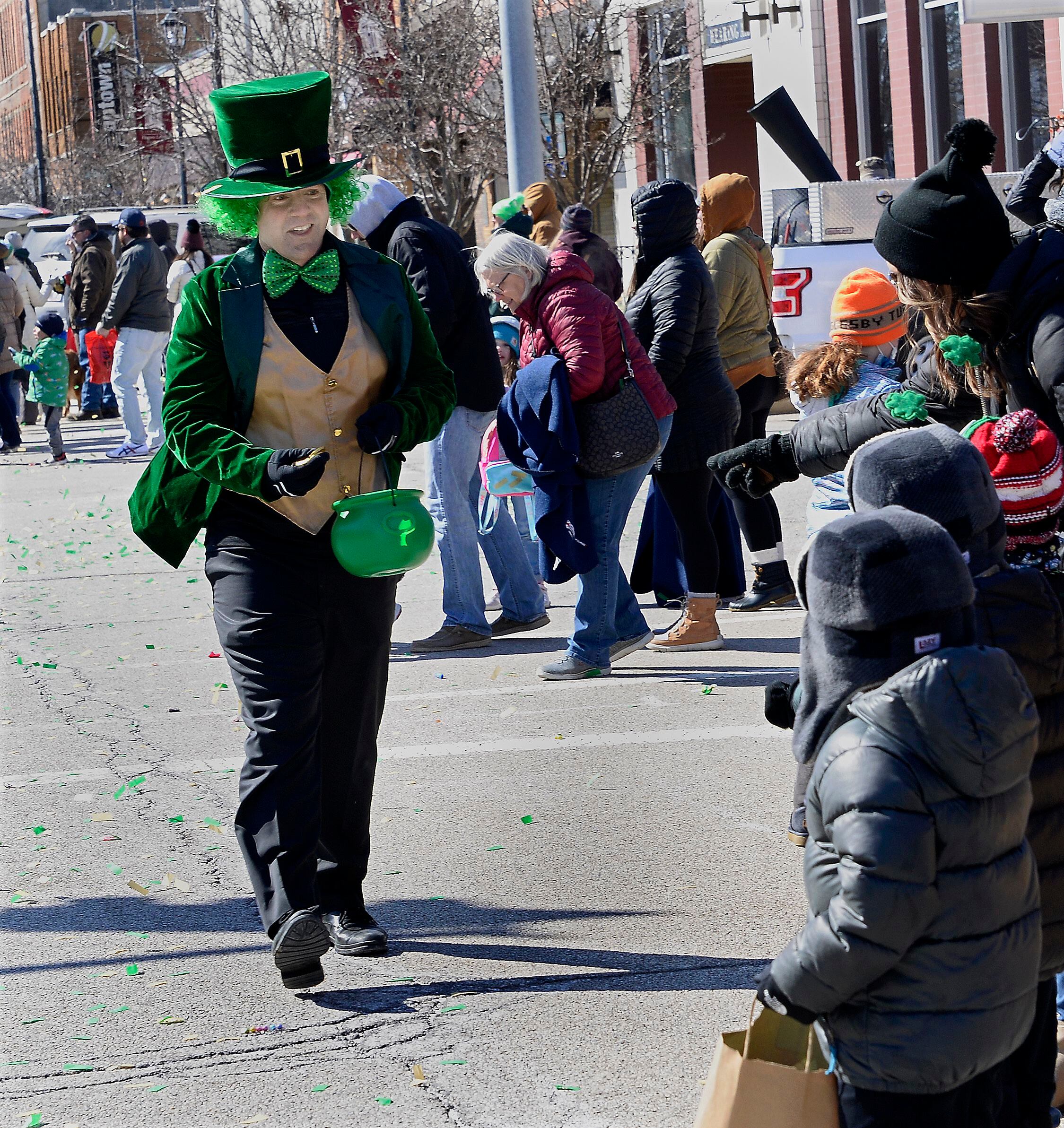 This larger than life leprechaun strolls along First Street in downtown La Salle handing out candy Saturday, March 12, 2022, during the St Patrick’s Day parade.