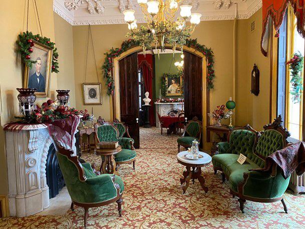 The original Reddick Mansion furniture is now on display in the center parlor of the Ottawa mansion, which is decorated for the holidays.