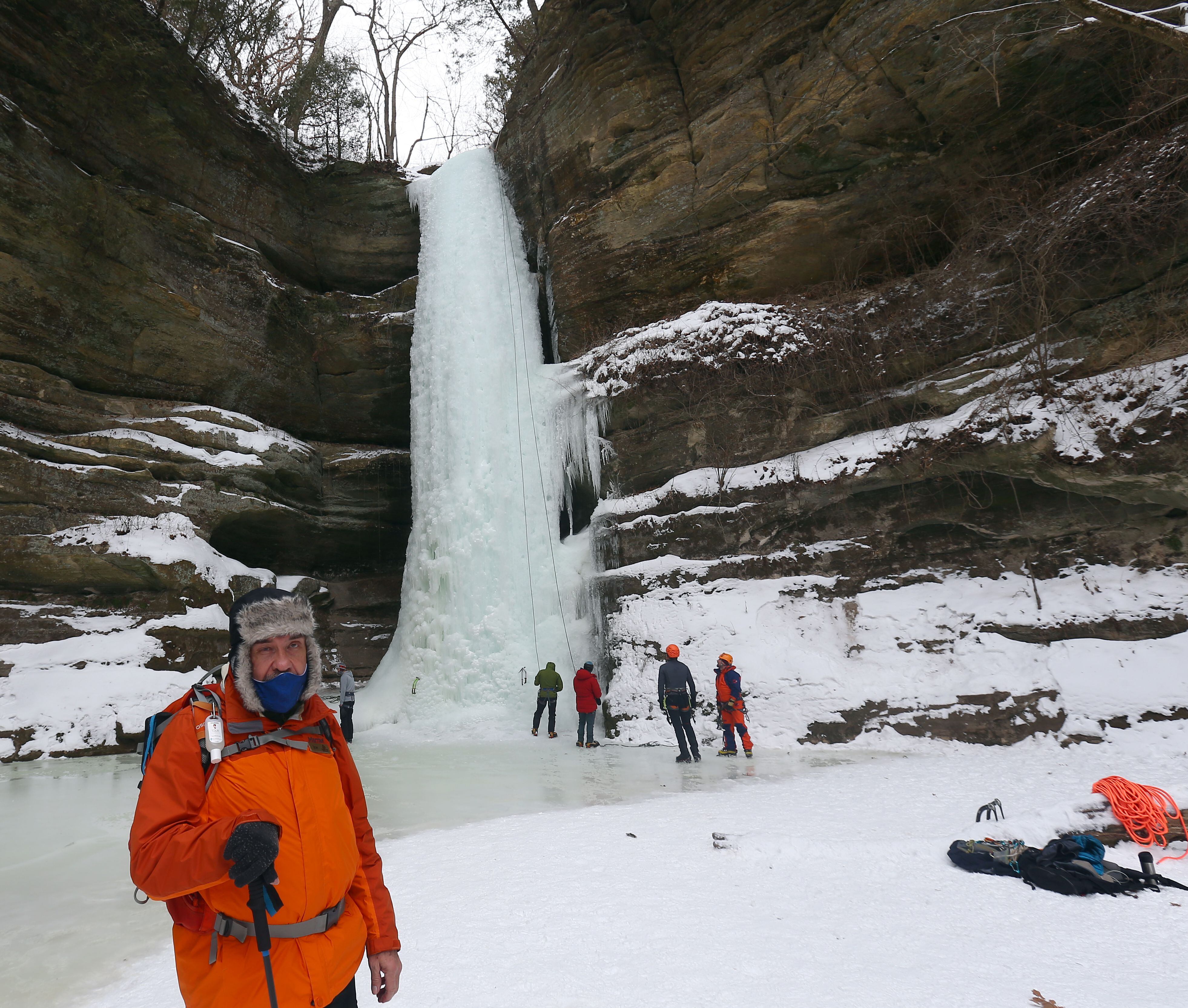 Joe Jakupcak, guided hike tour guide and retired geology teacher leads a group of tourists on a guided hike into Wildcat Canyon to watch the ice climbers on Sunday Feb, 21, 2021. Guided hikes are available to visitors on Saturdays and Sundays. See the Starved Rock Visitors Center for more information.