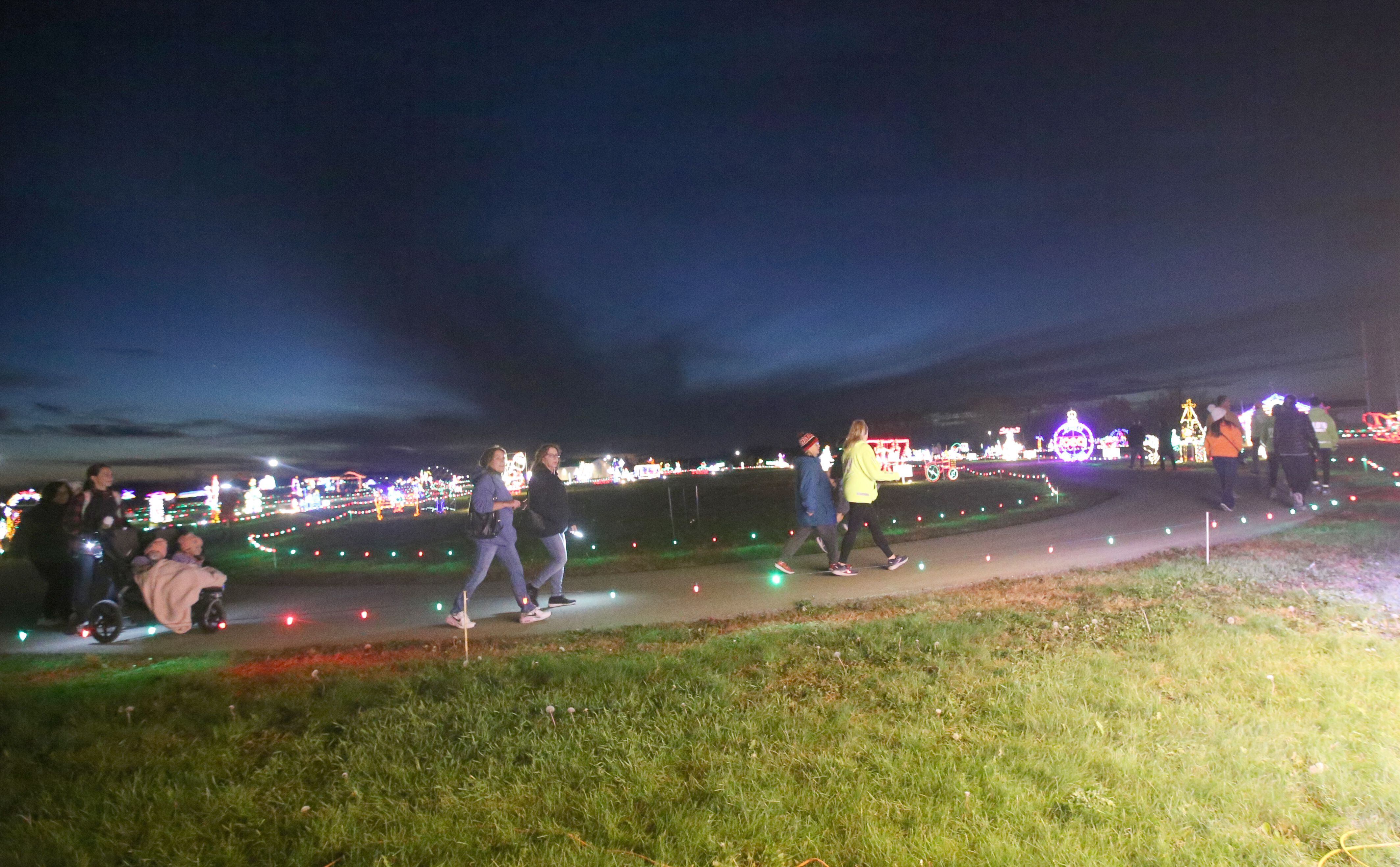 Participants make their way through the  Run Run Rudolph 5K Fun Run on Sunday, Nov. 5, 2023 at Rotary Park in La Salle. The Celebration Of Lights is the area’s largest drive-thru Christmas light display, stretching throughout Rotary Park on the east side of La Salle.